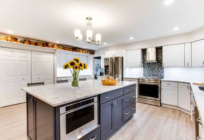 Traditional kitchen with navy blue cabinets